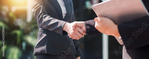 Fotografie successful negotiate and handshake concept, two businessman shake hand with part