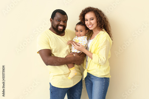 Happy African-American pare...