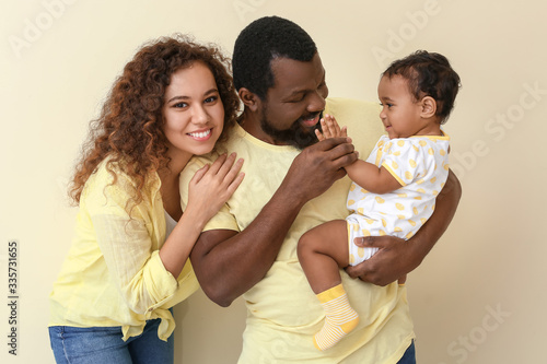 Happy African-American pare...