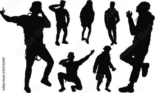 Vector set of black silhouettes of young hype people. Isolated.