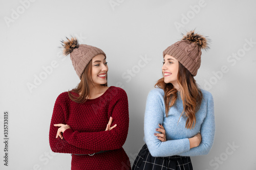 Young women in warm sweater...