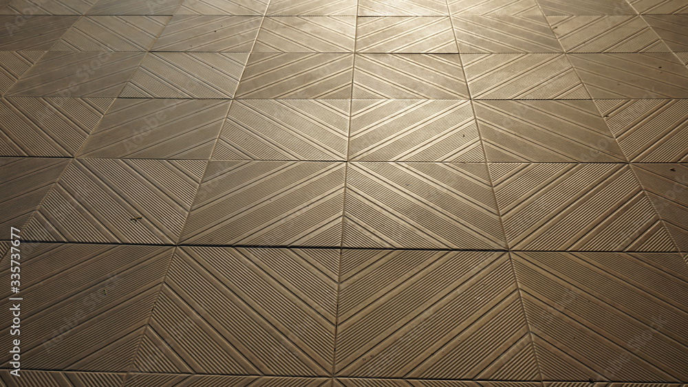 Obraz premium The brown tiled floor background