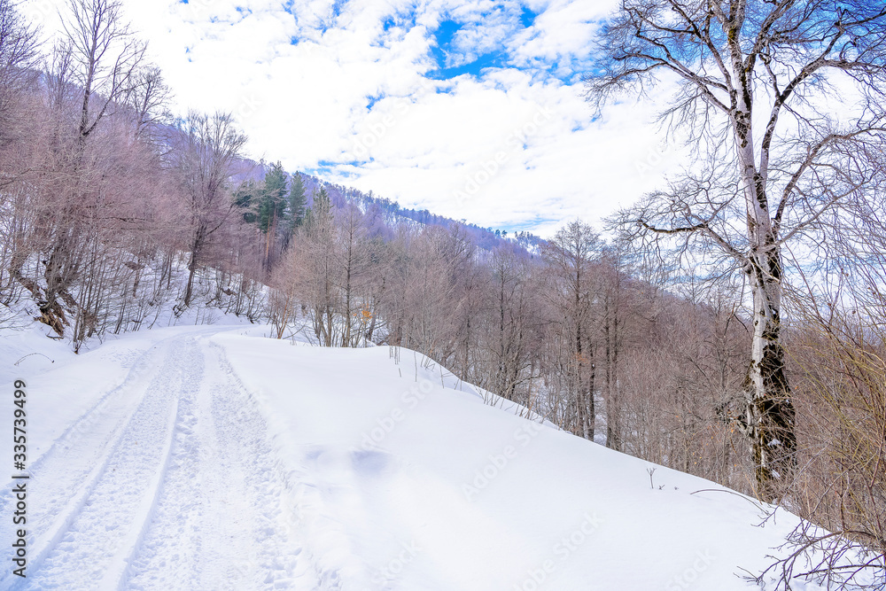 Beautiful snow-packed mountain road Beautiful snow-packed mountain road