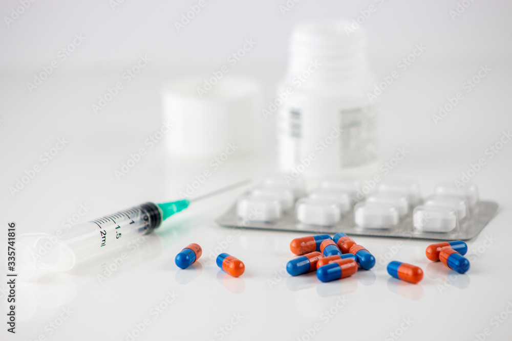 pills and syringe pills and syringe