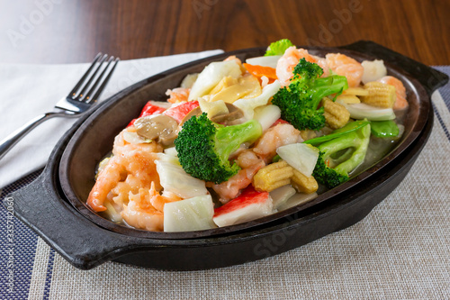 A view of a Chinese Seafood treasure entree, in a restaurant or kitchen setting.
