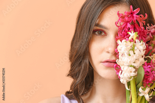 Beautiful young woman with ...