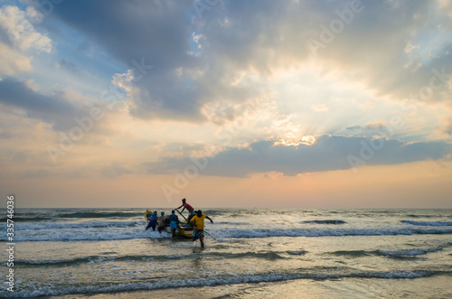 Photography Fishermen going to fishing from the shores of Mamallapuram aka Mahabalipuram in
