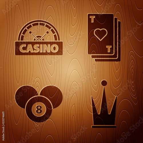 Set Crown, Casino signboard, Billiard pool snooker 8 ball and Playing card with heart on wooden background. Vector
