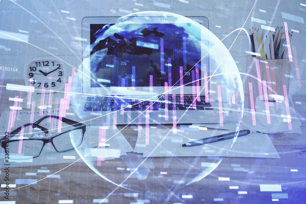 Financial chart drawing and table with computer on background. Multi exposure. Concept of international markets. Financial chart drawing and table with computer on background. Multi exposure. Concept of international markets.
