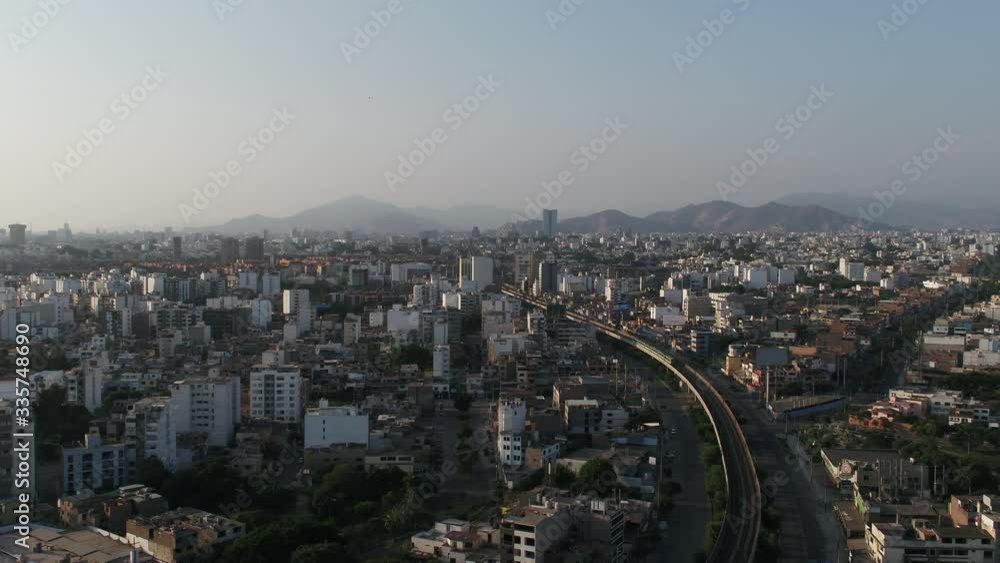 Forward aerial drone view of Aviacion Avenue in Surco district during the lockdown due to the Coronavirus pandemic in Lima city, Peru Forward aerial drone view of Aviacion Avenue in Surco district during the lockdown due to the Coronavirus pandemic in Lima city, Peru