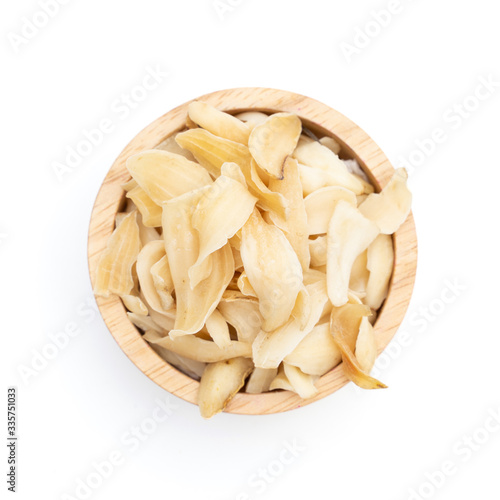 gastrodia elata wooden bowl isolated photo