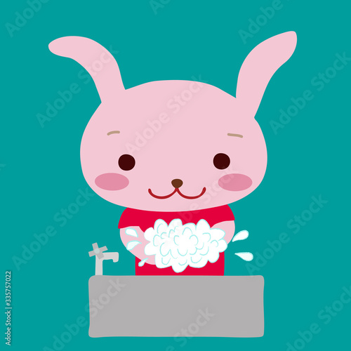 手を洗うかわいいうさぎ
A cute little rabbit washing hands