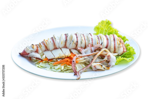 Isolated Grilled squid in vegetables in the plate on a white background with clipping path.
