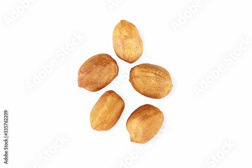 Dried raw peanuts isolated on white background with clipping path