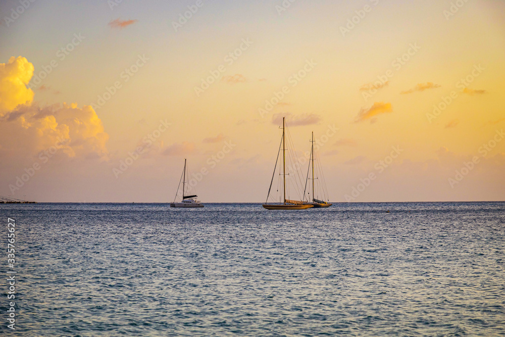 Fototapeta premium Sailboats at sunset.Yacht at sea