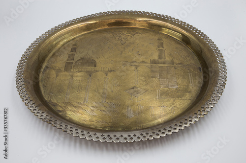 silver tray with hand-embroidered mosque motif