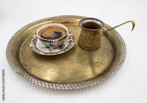 foamy traditional Turkish coffee and coffee pot