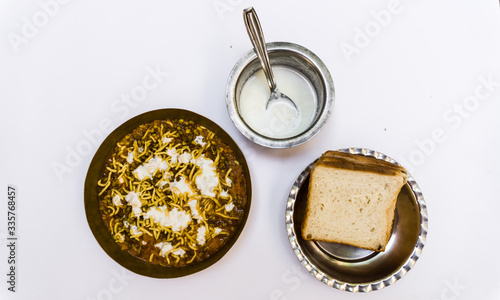 Puneri misal also known as poona misal. Puneri Misal is a special and popular item in Pune, Maharashtra. The dish is eaten for breakfast or as a midday snack or meal, often as part of misal pav. photo