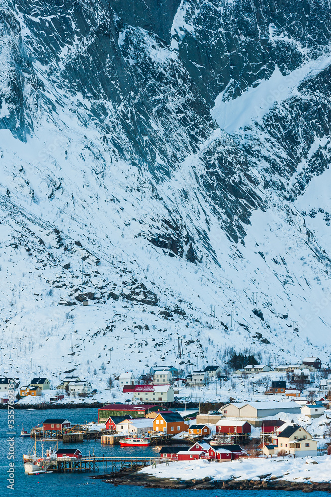 Buildings in front of snow covered mountains, Norway. Buildings in front of snow covered mountains, Norway.