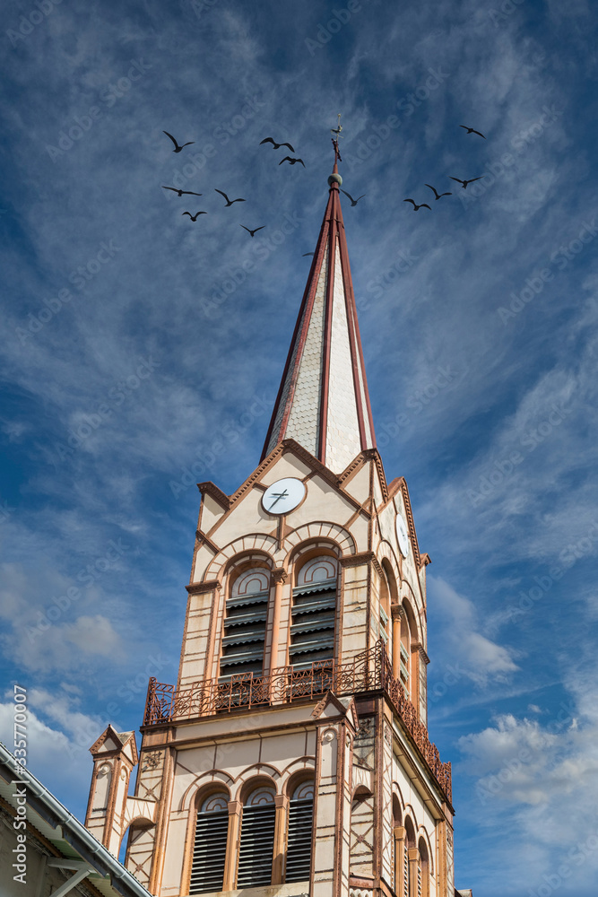 Old church steeple against sky on the island of Martinique Old church steeple against sky on the island of Martinique