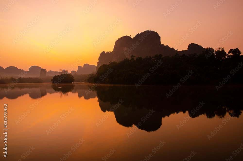 Amazing sunrise over lake in Thailand