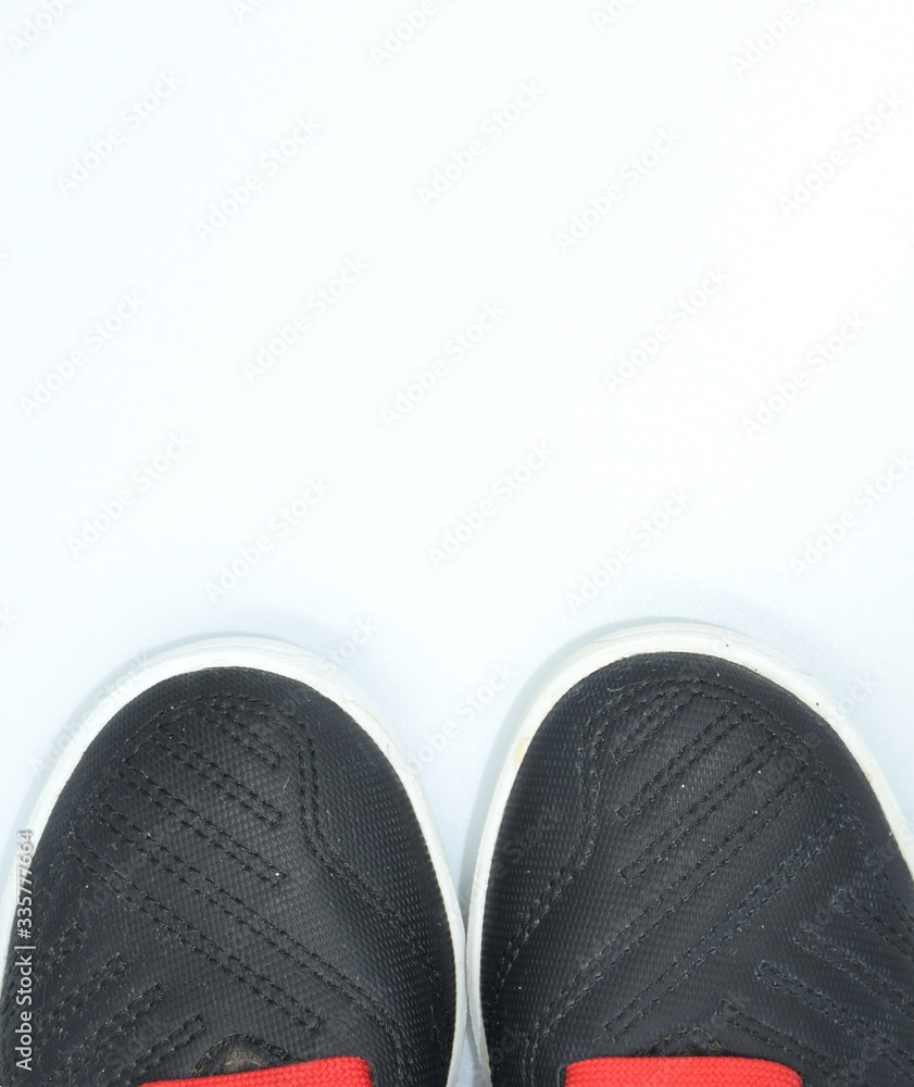 the boy shoes on white background with copy space for your text. the boy shoes on white background with copy space for your text.