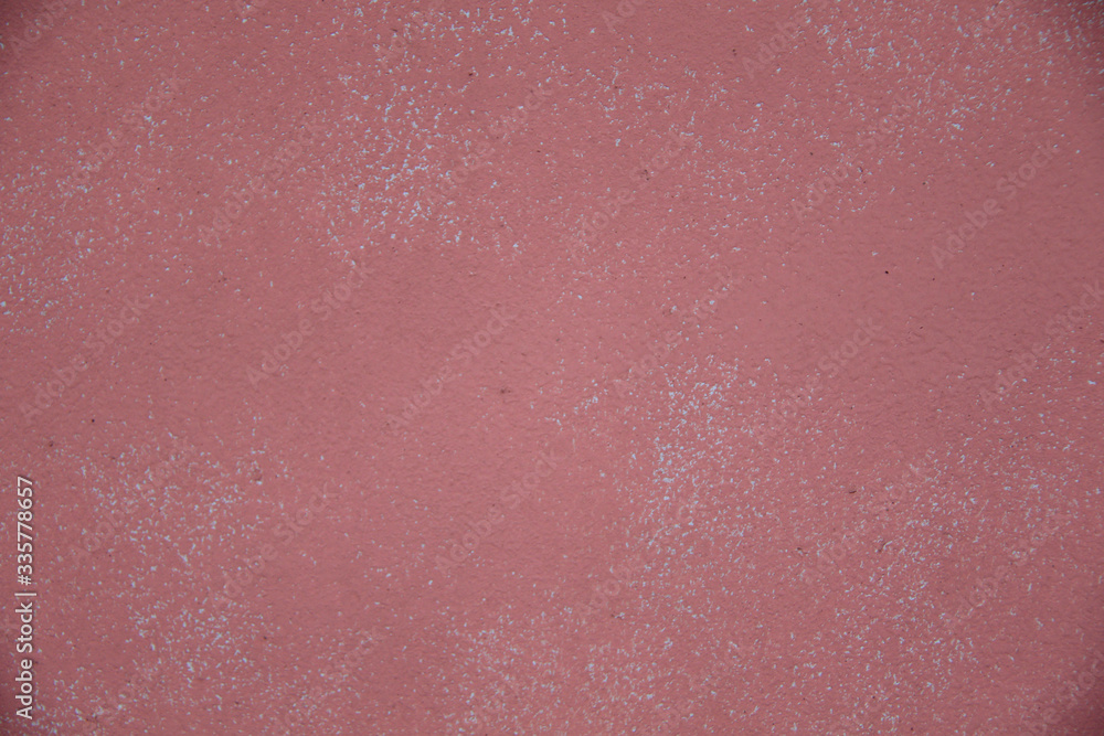 Fototapeta premium rough empty pink wall texture