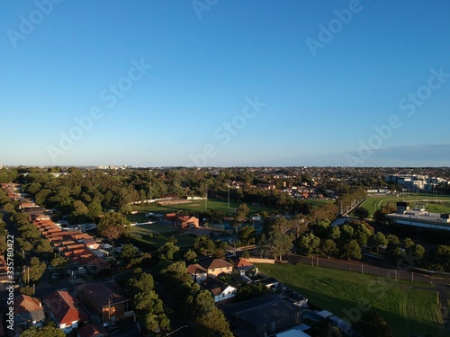 Drone panoramic aerial view of Sydney NSW Australia city Skyline and looking down on all suburbs 