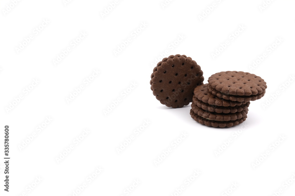 chocolate cream sandwich cookies with cream filling on a white background