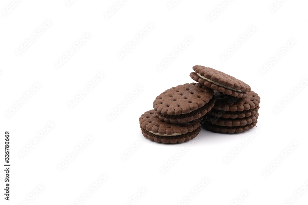 chocolate cream sandwich cookies with cream filling on a white background chocolate cream sandwich cookies with cream filling on a white background