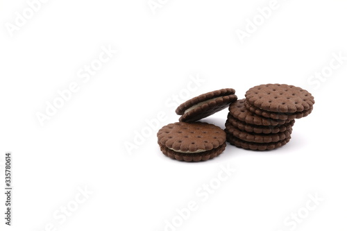 chocolate cream sandwich cookies with cream filling on a white background