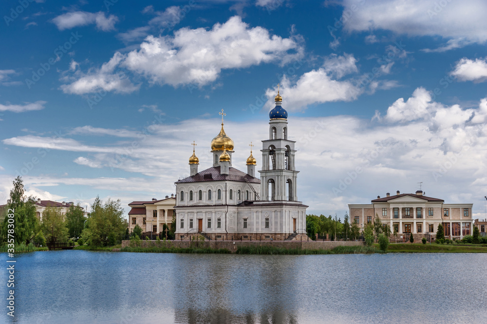 East Christian Orthodox Church by the Lake. Bright, summer day. East Christian Orthodox Church by the Lake. Bright, summer day.