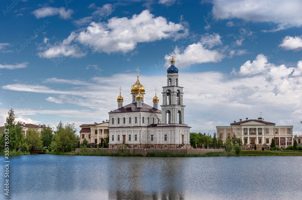 East Christian Orthodox Church by the Lake. Bright, summer day.