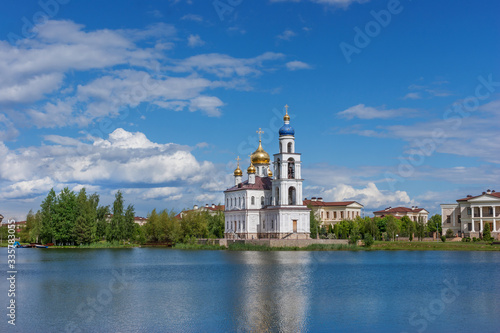 East Christian Orthodox Church by the Lake. Bright, summer day.