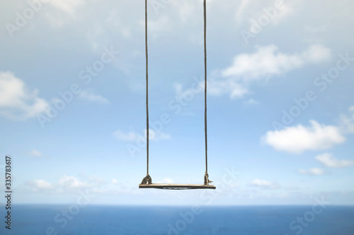 swing without anyone flies free in the sky