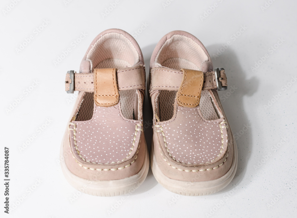 cute little vintage retro pink baby dolly shoes, isolated on a white ...