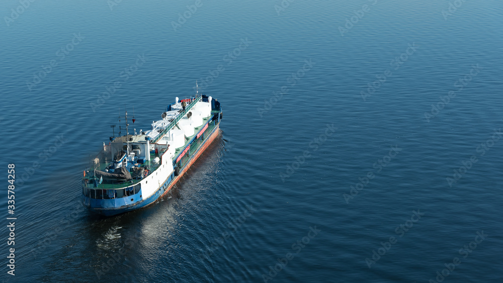 A tanker with liquefied petroleum gas or oil floats during a decline in oil prices and the global crisis A tanker with liquefied petroleum gas or oil floats during a decline in oil prices and the global crisis