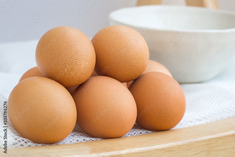 eggs on wood table on white background eggs on wood table on white background