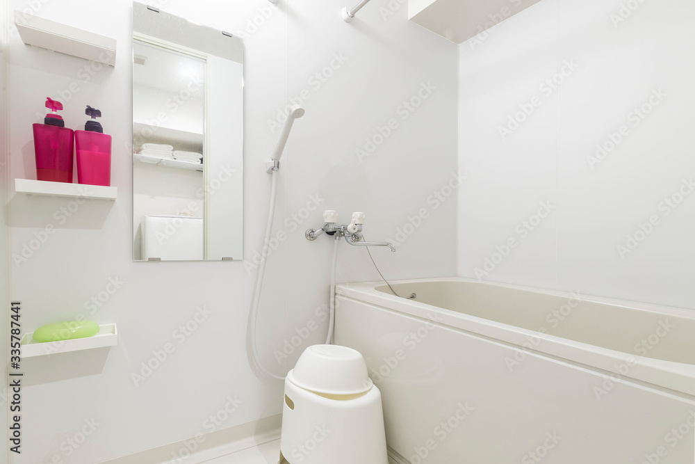 Bath tub in a small bathroom at the apartment Bath tub in a small bathroom at the apartment