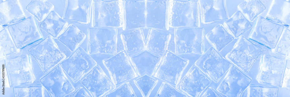 ice cubes cold screen saver, ingredient for cocktails and drinks in the hot season, panoramic image