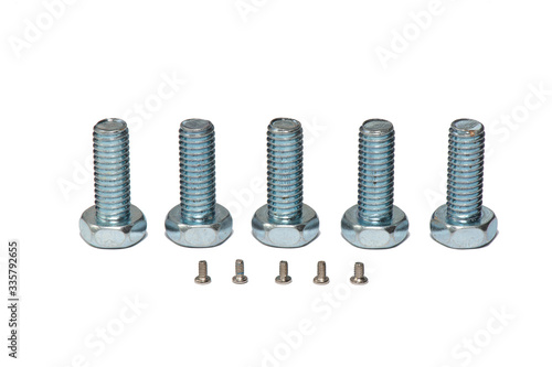 Steel screws isolated on a white background. stand in a row