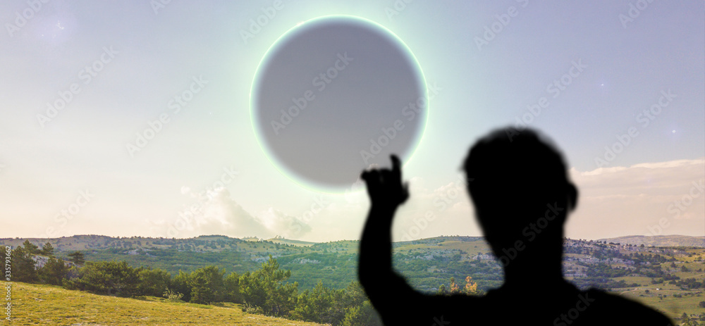 a back view of the person watching the solar eclipse in the sky from the earth, elements of this image is furnished by nasa