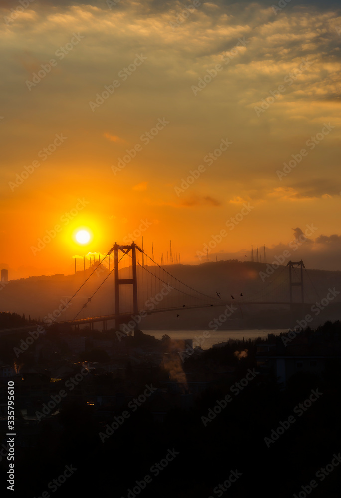 Sunrise and sunset view of Istanbul Bosphorus Bridge.