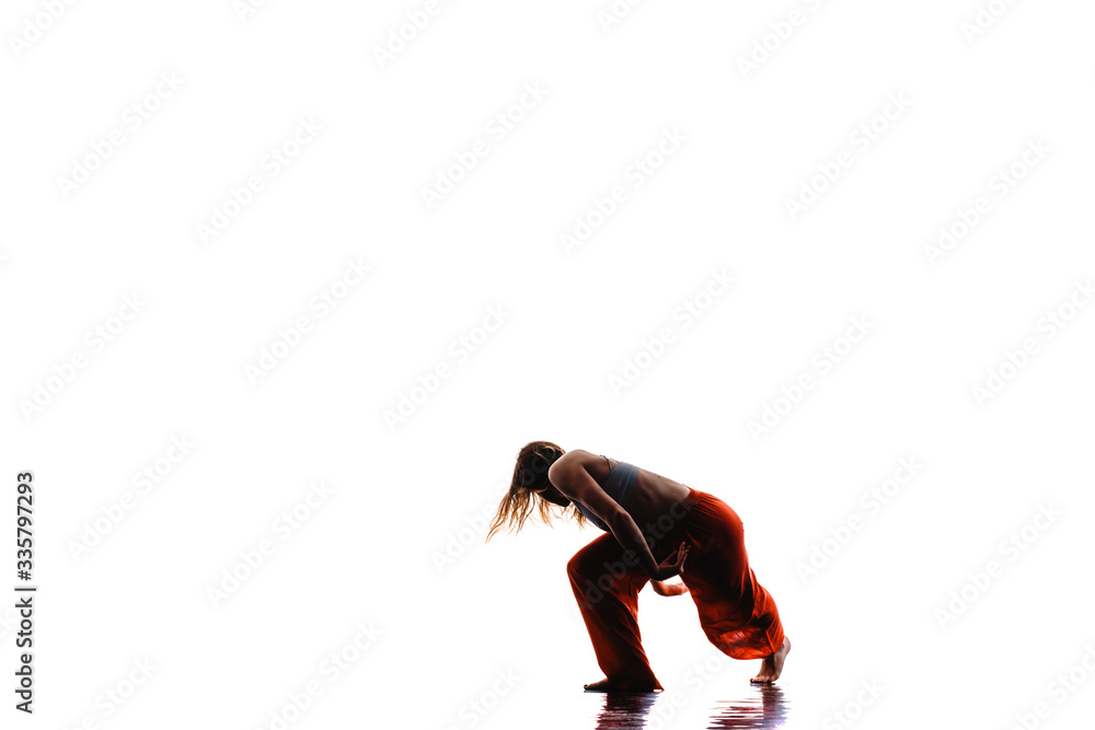 Modern dance performer isolated on white wall