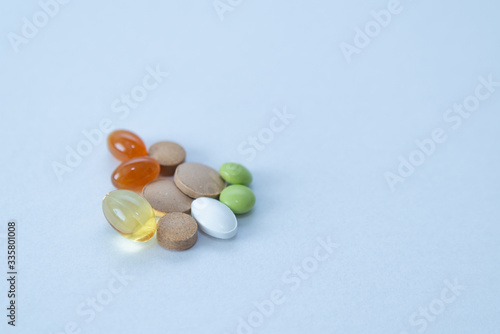 colorful pills on white