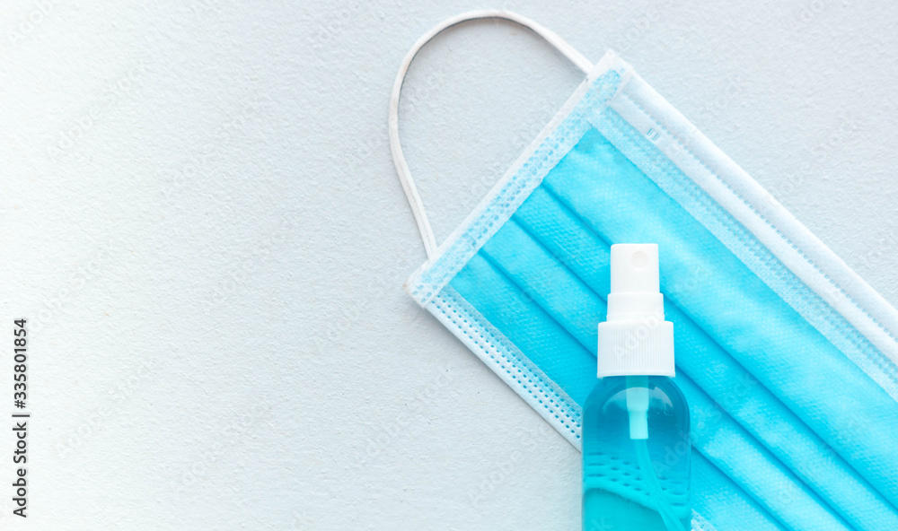 blue alcohol gel bottle with surgical mask,alcohol gel and medical mask for cleaning hand to protect corona virus( covid-19 ) blue alcohol gel bottle with surgical mask,alcohol gel and medical mask for cleaning hand to protect corona virus( covid-19 )