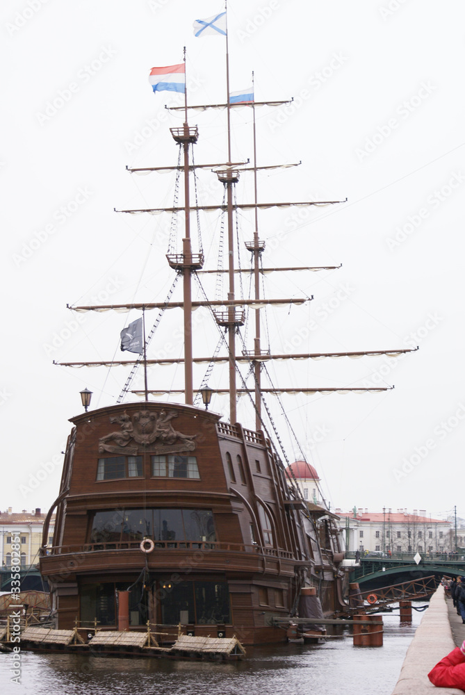 Naklejka premium Ancient ship on the river
