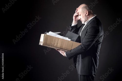 A man with a box of office ...