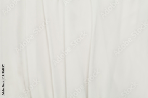 White silk smooth background. Fabric satin texture.