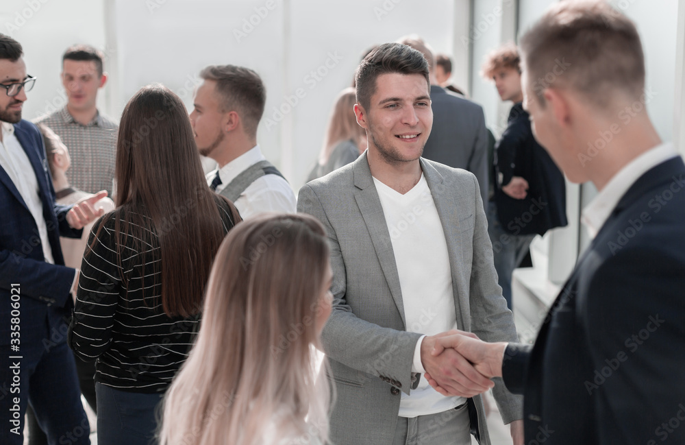 business people shaking hands with each other business people shaking hands with each other